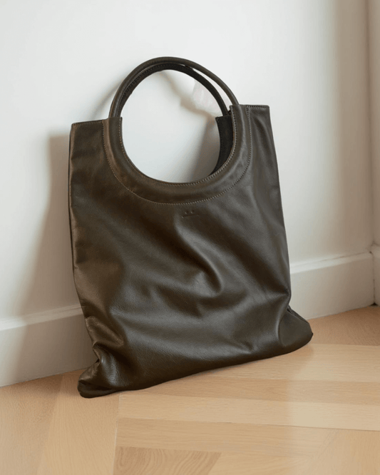 Mixed Emotions Reversible Tote in dark suede, stylish and versatile, perfect for everyday use.