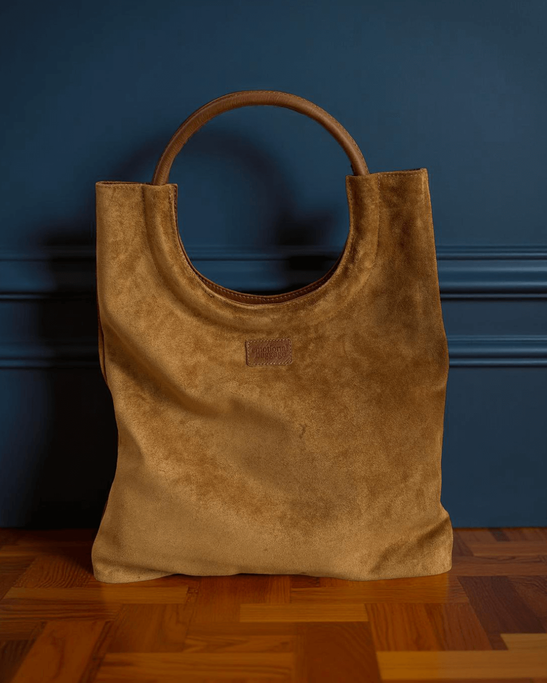 Mixed Emotions Reversible Tote in tan suede, stylish and spacious, perfect for everyday use.