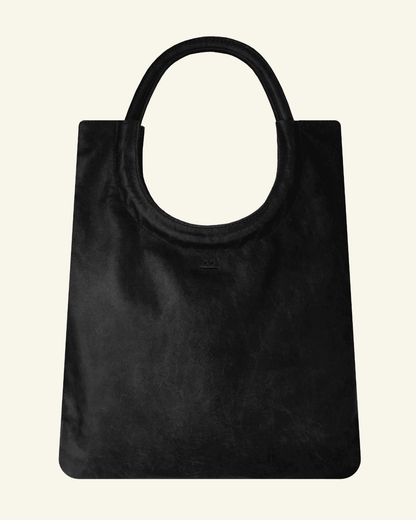 Mixed Emotions Reversible Tote in Noir (black), featuring suede and leather, stylish and spacious for everyday essentials.