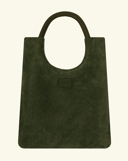 Mixed Emotions Reversible Tote in rich green suede, stylish and spacious for versatile fashion and everyday use.